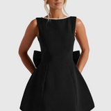 Sandra – sleeveless Mini Dress with Pearl Neckline Detail in Blush Black and White