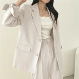 Kaizo Elegant Tailored Blazer and Trouser Set with Modern Relaxed Fit