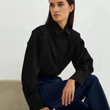 Women's boxy shirt with multiple buttons