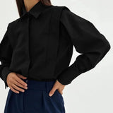 Women's boxy shirt with multiple buttons